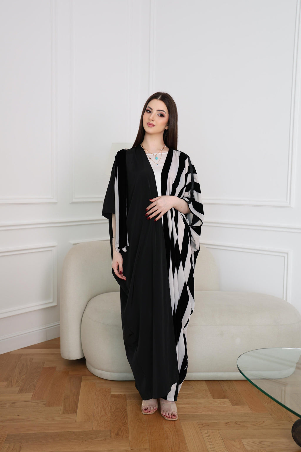 Black abaya, asymmetric abaya, black and white abaya, modern abaya, luxury abaya, modest fashion, Dubai abaya, designer abaya