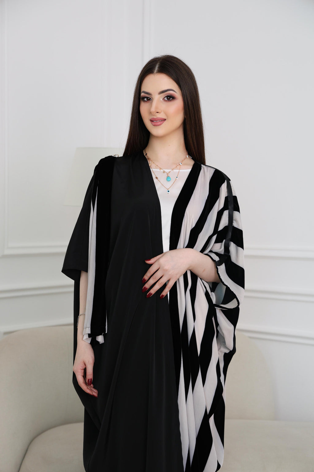 Black abaya, asymmetric abaya, black and white abaya, modern abaya, luxury abaya, modest fashion, Dubai abaya, designer abaya