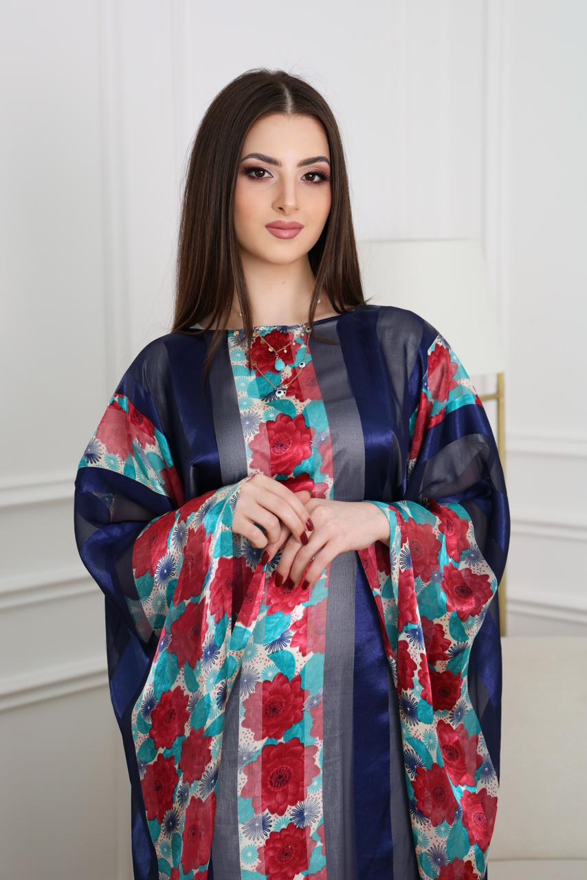 Luxury rose abaya with blue and red tones, designed in Dubai. Elegant, lightweight, and perfect for everyday wear and special occasions.