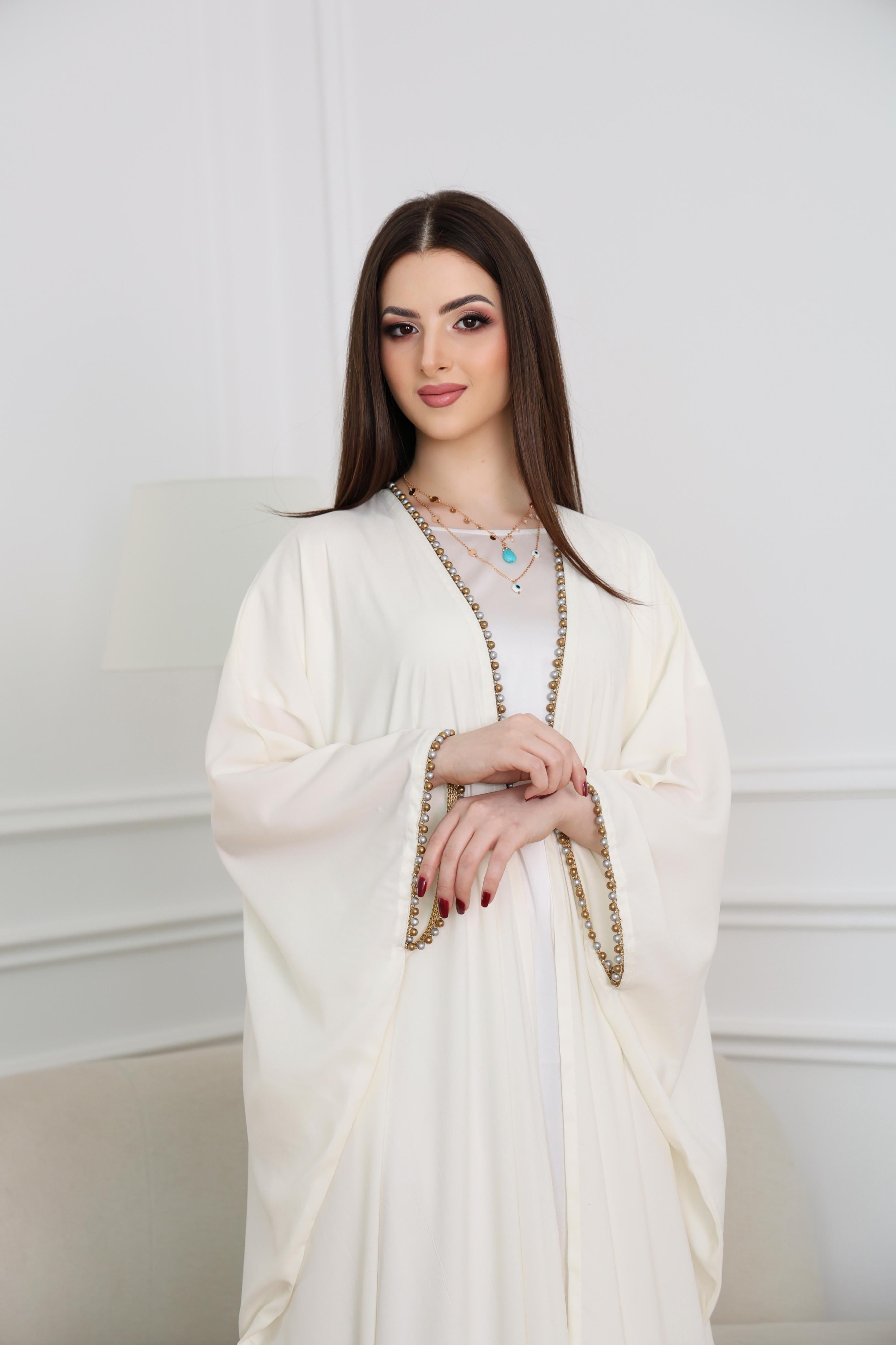 White abaya, pearl abaya, luxury white abaya, embellished abaya, modest fashion, bridal abaya, Eid abaya, elegant abaya, Dubai abaya