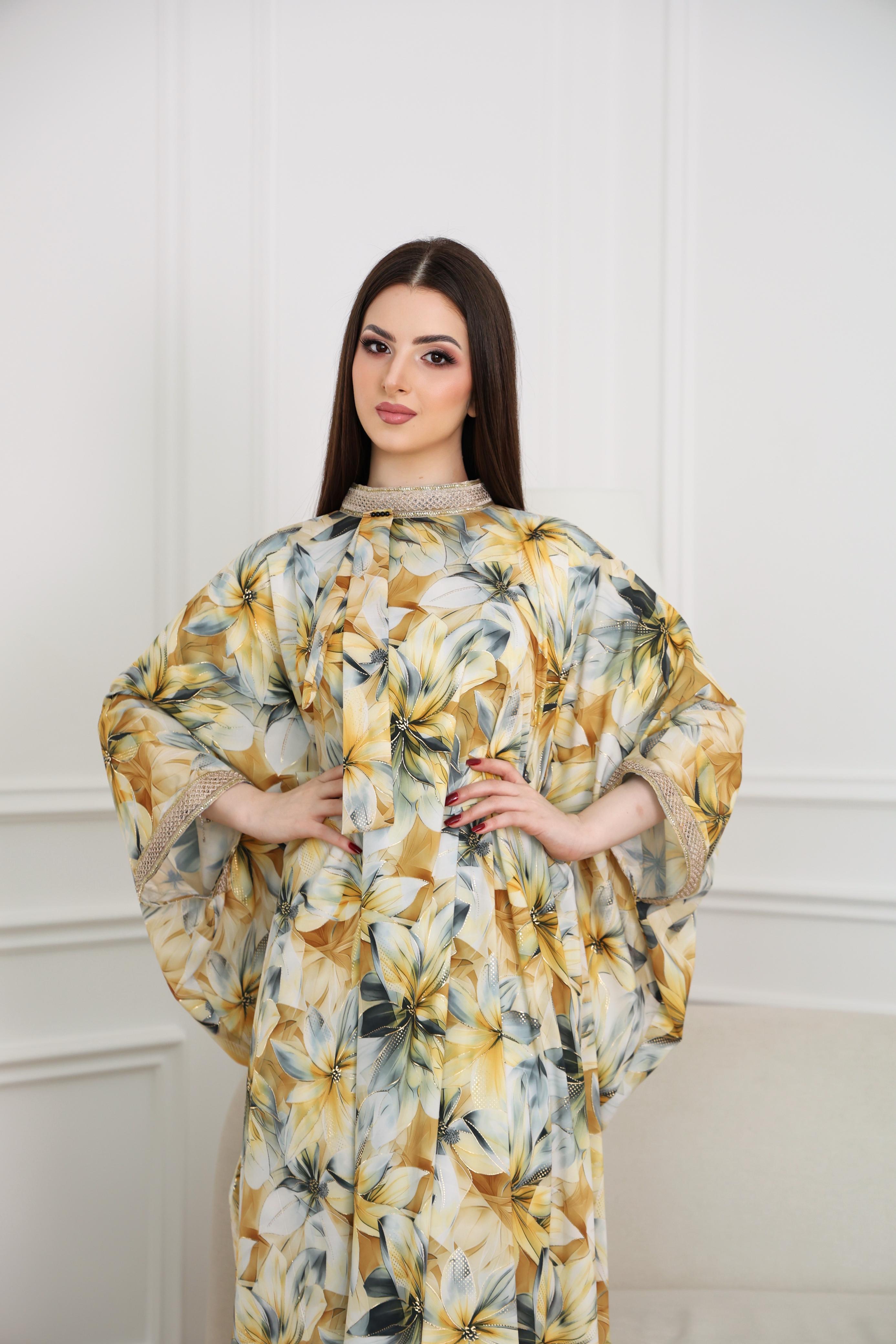 Woman wearing a floral dress with a neutral background